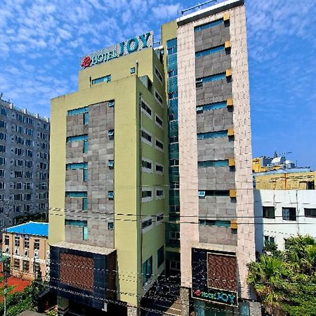 Joy Hotel Jeju Bagian luar foto