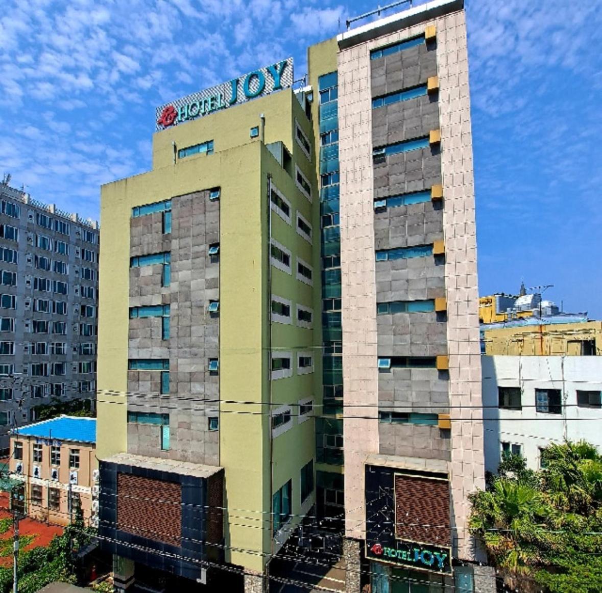 Joy Hotel Jeju Bagian luar foto