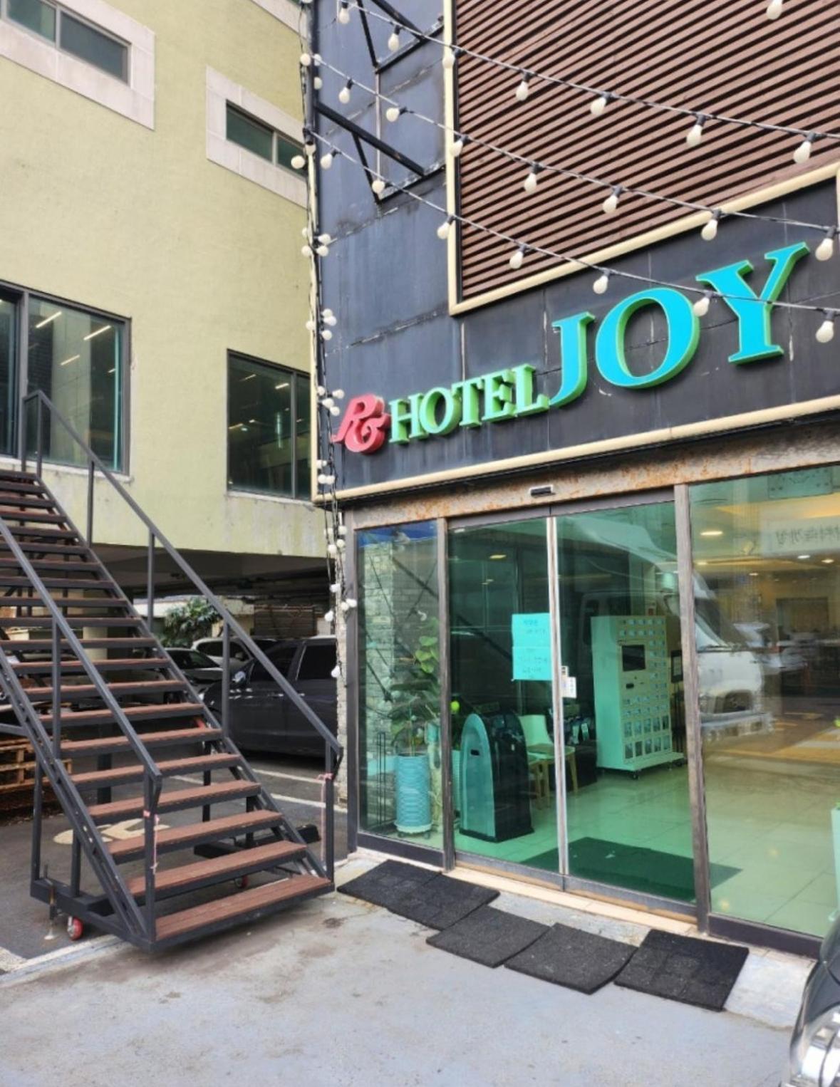 Joy Hotel Jeju Bagian luar foto
